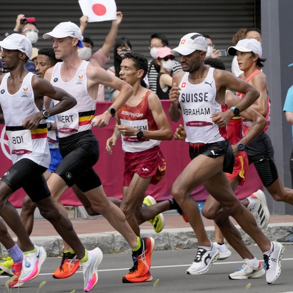 epa09404960 Tadesse Abraham of Switzerland competes in the Men&#039;s Marathon during the Athletics events of the Tokyo 2020 Olympic Games at the Odori Park in Sapporo, Japan, 08 August 2021. EPA/KIMI ...