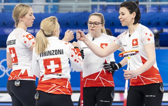 Switzerland skip Silvana Tirinzoni, 2nd left, and her teammates Melanie Barbezat, left, Alina Paetz, 2nd right, and Esther Neuenschwander, right, react during the Curling semifinal game of the women&# ...