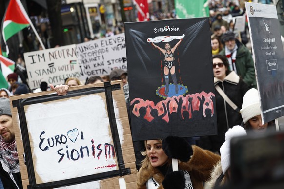 epa11160994 Protesters take part in a demonstration organized by &#039;Together for Palestine&#039; demanding cease-fire in Gaza and to exclude Israel from the Eurovision Song Contest, in central Stoc ...