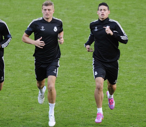 Die Neuzugänge Toni Kroos (l.) und James Rodriguez haben Angel di Maria dazu veranlasst, nach England zu gehen.