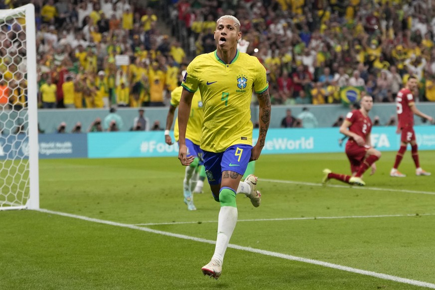 Brazil&#039;s Richarlison celebrates after scoring the opening goal during the World Cup group G soccer match between Brazil and Serbia, at the Lusail Stadium in Lusail, Qatar, Thursday, Nov. 24, 2022 ...