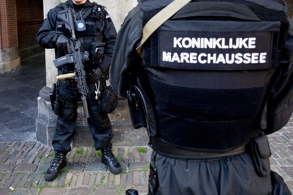 epa07446572 Members of the military police arrive to heighten security around the Binnenhof, The Hague, The Netherlands, 18 March 2019. Security measures are being put in places in the aftermath of th ...