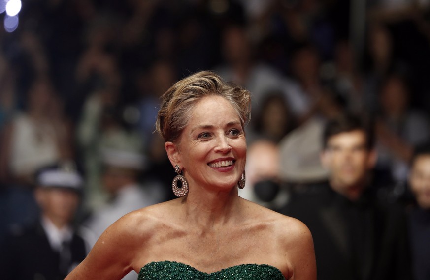 epa09970369 Sharon Stone arrives for the screening of &#039;Crimes of the Future&#039; during the 75th annual Cannes Film Festival, in Cannes, France, 23 May 2022. The movie is presented in the Offici ...