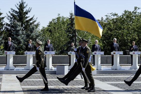 KEYPIXepa13186120 Ukrainian servicemen attend the ceremony of the National Flag raising in Kyiv, Ukraine, 23 August 2026, amid the ongoing Russian invasion. Ukraine celebrates the National Flag Day on ...