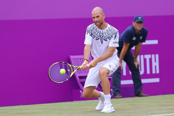 epa09279207 France&#039;s Adrian Mannarino in action against Great Britain&#039;s Daniel Evans during their match on day 4 of the Cinch Championships at the Queen&#039;s Club in London, Britain, 17 Ju ...