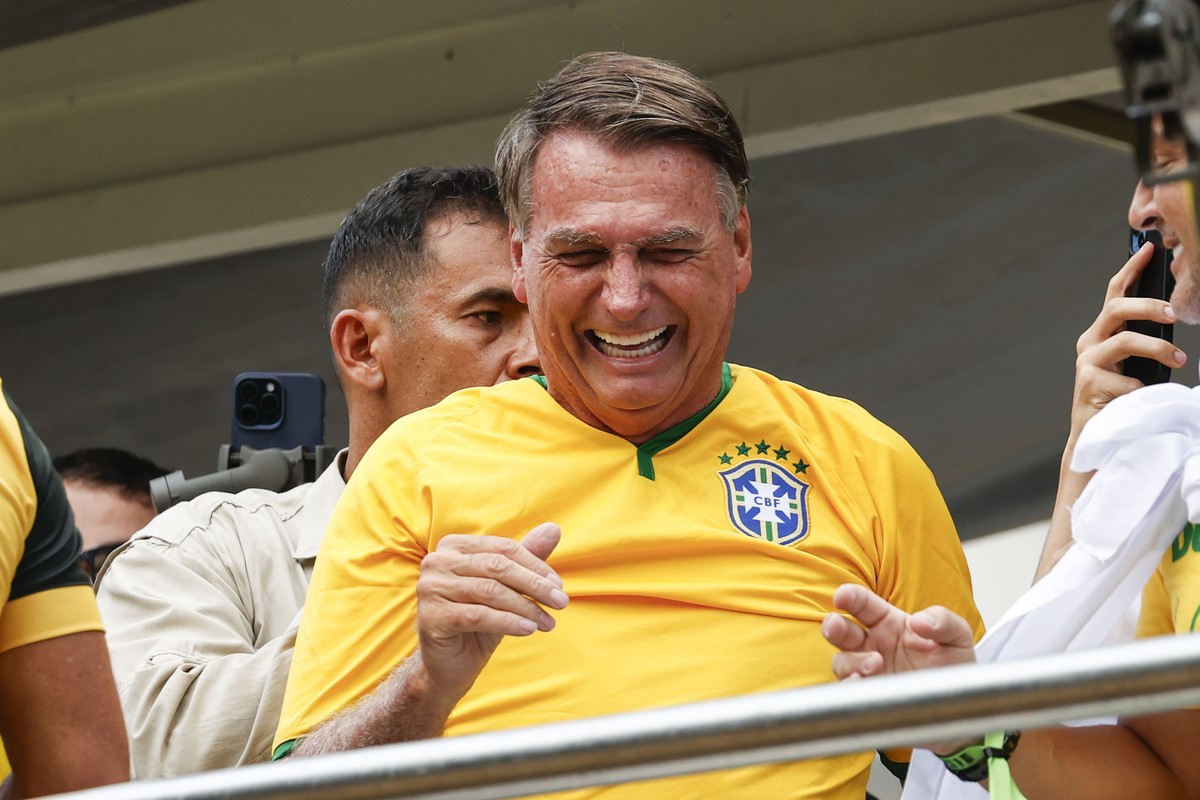 epa11181480 Former Brazilian President Jair Bolsonaro greets supporters during a rally in Sao Paulo, Brazil, 25 February 2024. Bolsonaro called his supporters to take to the streets of Sao Paulo while ...