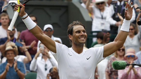 Spain&#039;s Rafael Nadal celebrates after beating Portugal&#039;s Joao Sousa in a Men&#039;s singles match during day seven of the Wimbledon Tennis Championships in London, Monday, July 8, 2019. (AP  ...