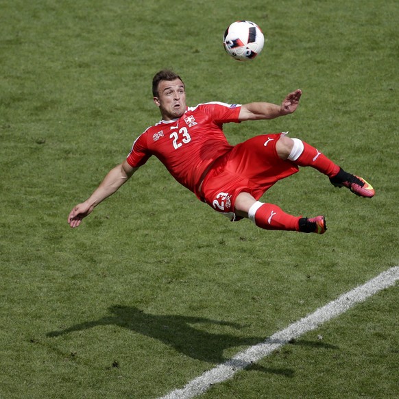 epaselect epa05389778 Xherdan Shaqiri of Switzerland scores the 1-1 during the UEFA EURO 2016 round of 16 match between Switzerland and Poland at Stade Geoffroy Guichard in Saint-Etienne, France, 25 J ...