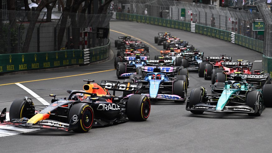 epa10660232 Drivers start the race with Dutch Formula One driver Max Verstappen of Red Bull Racing leading during the Formula One Grand Prix of Monaco at the Circuit de Monaco in Monte Carlo, Monaco,  ...