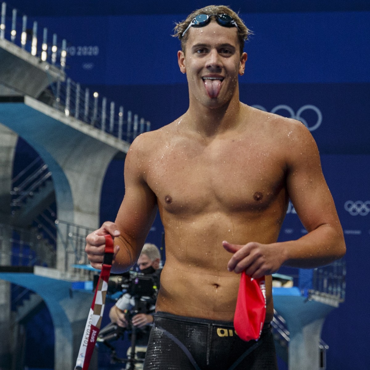 epa09367608 Noe Ponti of Switzerland walks out after competing in the men's 200m Butterfly Heats during the Swimming events of the Tokyo 2020 Olympic Games at the Tokyo Aquatics Centre in Tokyo,  ...