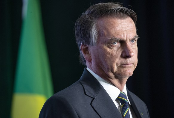 epa10446309 Former President of Brazil Jair Bolsonaro attends the 