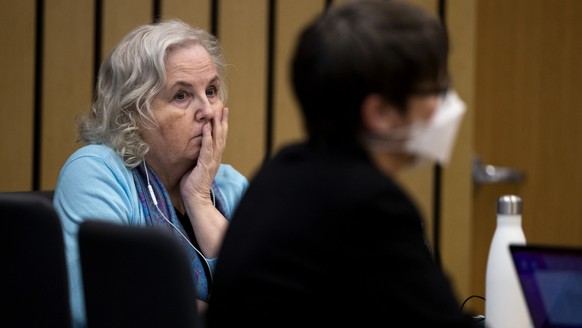 FILE - Romance writer Nancy Crampton Brophy, left, accused of killing her husband, Dan Brophy, in June 2018, watches proceedings in court in Portland, Ore., Monday, April 4, 2022. A jury in Portland,  ...