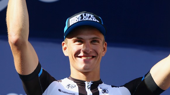 German cyclist Marcel Kittel of Team Giant-Shimano jubilates as he wins on the fourth and final stage of the Dubai Tour in Dubai, United Arab Emirates, Saturday, Feb. 8, 2014. (AP Photo/Marwan Naamani ...