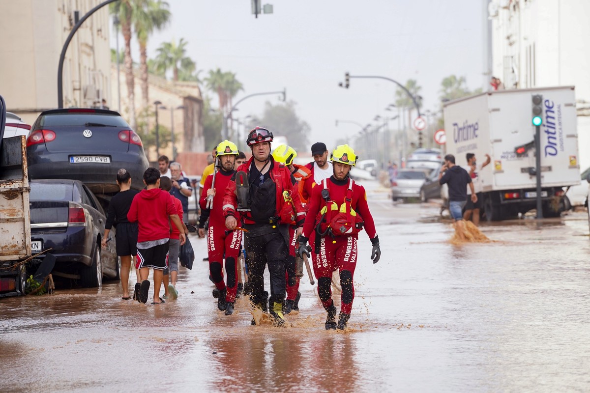 VALENCIA, SPAIN - OCTOBER 30: Officials conduct search and rescue operations after a deluge brought up to 200 liters of rain per square meter (50 gallons per square yard) in hours in towns across the  ...