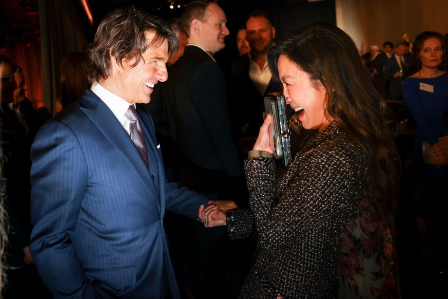 Beverly Hills, CA - February 13: Tom Cruise and Michelle Yeoh attends the 95th Academy Awards Nominees Luncheon at the Beverly Hilton , in Beverly Hills, CA, Monday, Feb. 13, 2023. The Oscars will bro ...