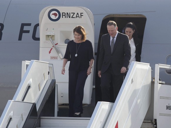 epa05637341 Prime Minister of New Zealand John Key (C) arrives in Lima, Peru, on 18 November 2016, in the framework of the Asia Pacific Economic Cooperation Forum (APEC). EPA/German Falcon