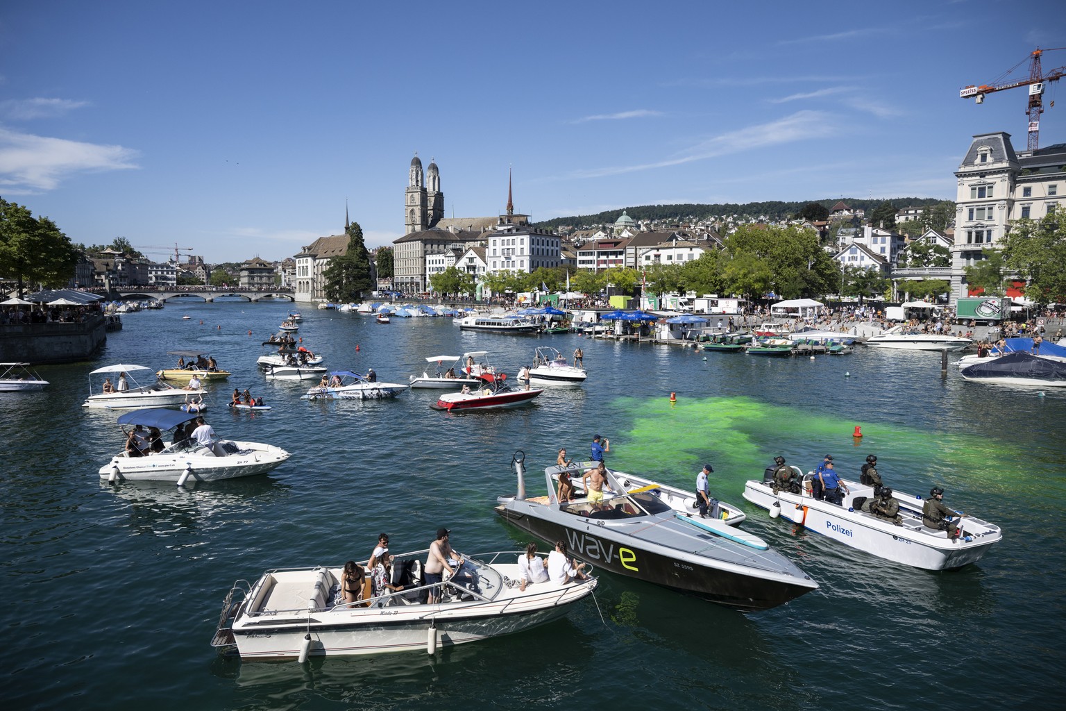 epa10118772 Police officers during the 29th Street Parade in the city center of Zurich, Switzerland, 13 August 2022. The annual dance music event Street Parade runs this year under the motto 'THI ...