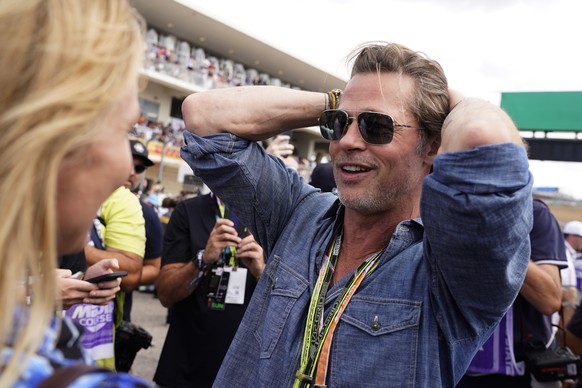 epa10261948 US actor Brad Pitt at the United States Formula One Grand Prix at the Circuit of The Americas in Austin, Texas, USA, 23 October 2022. EPA/SHAWN THEW