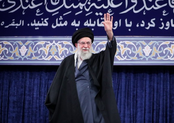 epa12749110 A handout photo made available by the Iranian supreme leader's office shows Iranian Supreme Leader Ayatollah Ali Khamenei greeting the crowd during a ceremony in Tehran, Iran, 17 Febr ...
