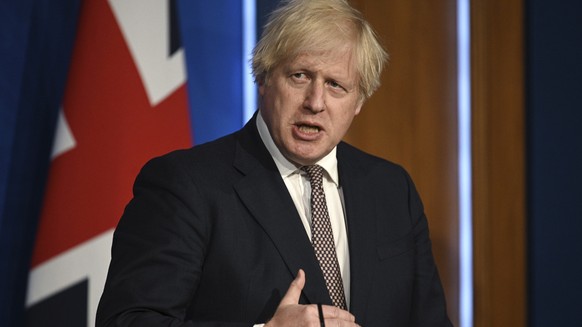 Britain's Prime Minister Boris Johnson speaks during a media briefing on coronavirus in Downing Street, London, Monday, July 5, 2021. Johnson says people in England will no longer be required by law t ...