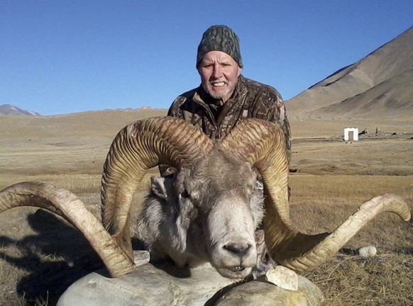 This Dec. 2012 photo provided by Rick Vukasin shows Vukasin, 65, of Great Falls, Mont., posing with a rare argali sheep known as the &quot;Marco Polo&#039;&#039; that he shot in the Pamir mountains of ...