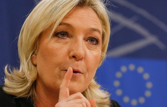 epa04576128 Leader of the French party National Front (FN) Marine Le Pen holds a press conference at the EU Parliament in Brussels, Belgium, 22 January 2015. Marine Le Pen reacts to the announcement o ...