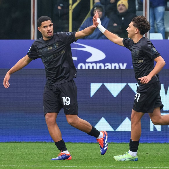 Simon Sohm Parma Calcio celebrates with Anas Haj Mohamed Parma Calcio after scoring the goal of 1-1 during Parma Calcio vs Hellas Verona FC, Italian soccer Serie A match in Parma, Italy, December 15 2 ...