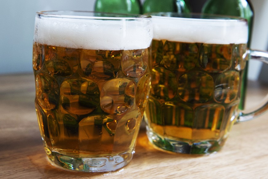 epa06848215 An illustration showing some beer in a pint glass in Central London, Britain, 28 June 2018. Reports have emerged that Britain&#039;s largest pub group, Ei Group, is running low on CO2 gas  ...