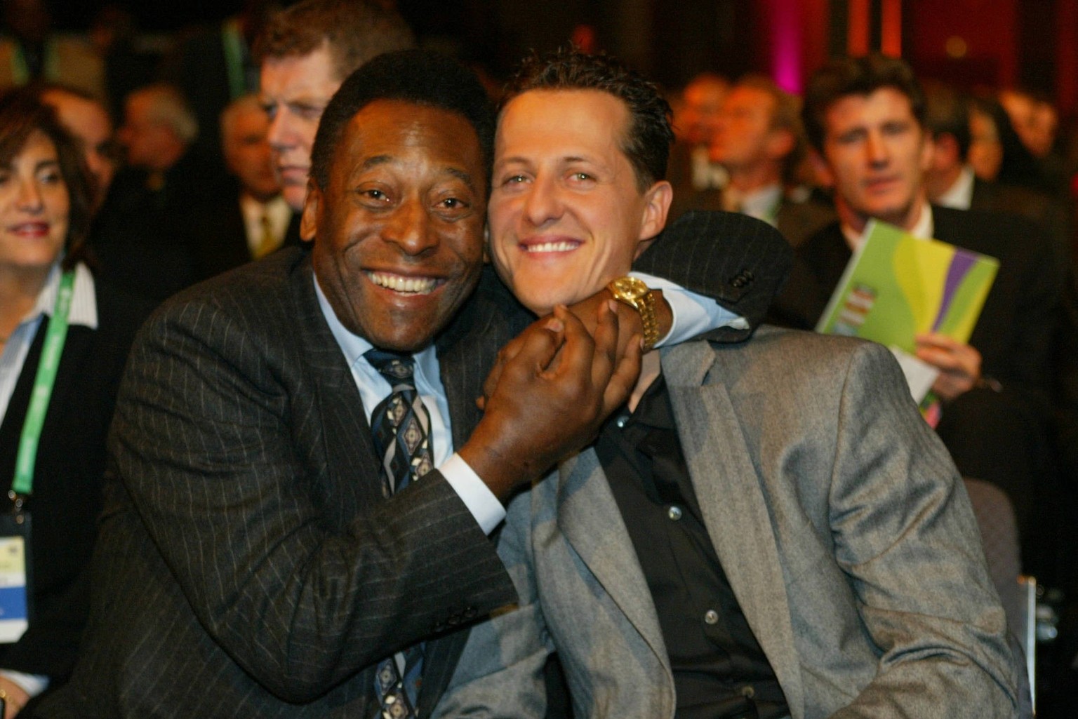 Pele Files Former Brazilian soccer legend Pele and German Formula one world champion Michael Schumacher joke in Frankfurt, Germany on December 5, 2003 at the start of the soccer World Cup 2003 prelimi ...