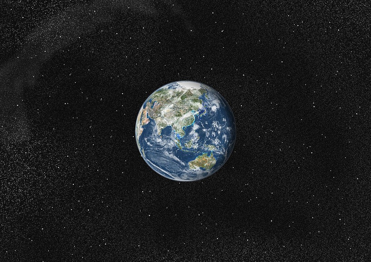 True colour satellite image of the Earth centred on Asia and Oceania with cloud coverage. This image in orthographic projection was compiled from data acquired by LANDSAT 5 &amp; 7 satellites., Globe  ...