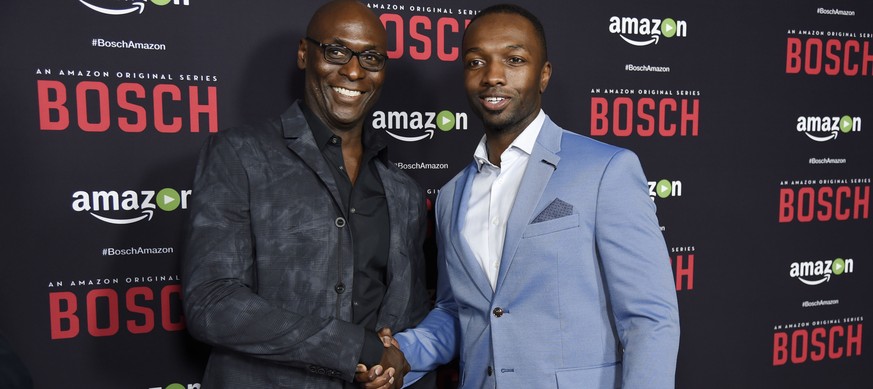 Lance Reddick, left, and Jamie Hector, cast members in &quot;Bosch,&quot; pose together at the season two premiere of the Amazon original series at the Pacific Design Center on Thursday, March 3, 2016 ...