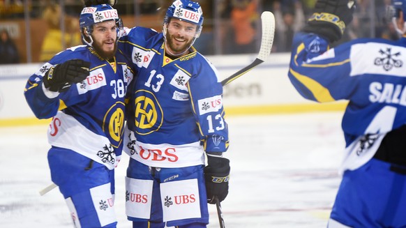 Davos` goalgetter Jeremy Morin celebrates with Robert Kousal after scoring 1:0 during the game between HC Davos and Mountfield HK at the 91th Spengler Cup ice hockey tournament in Davos, Switzerland,  ...