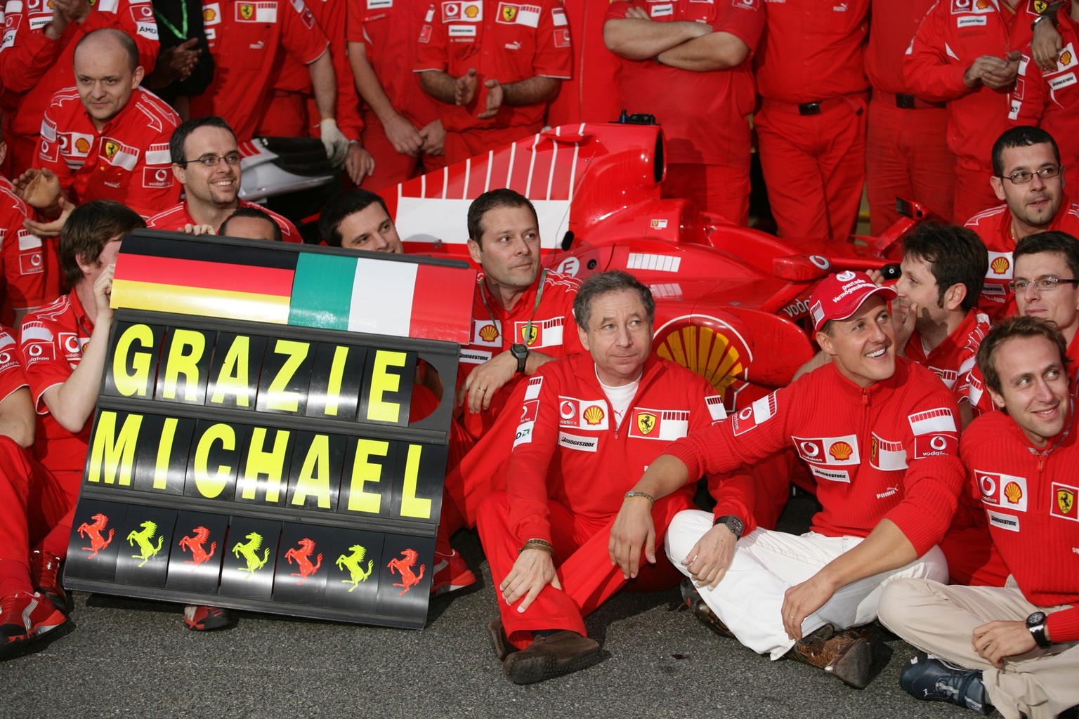 2006 Brazilian Grand Prix - Sunday Race Interlagos, Sao Paulo, Brazil. 19th - 22nd October 2006. The Ferrari team say goodbye to Michael Schumacher after the 7 times World Champion retires, portrait.  ...