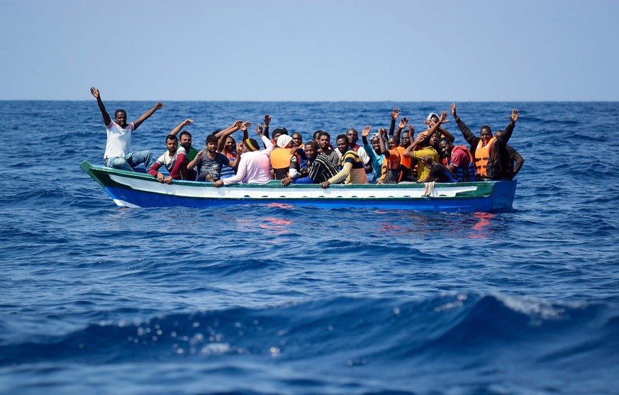 epa06947850 A handout photo made available by SOS Mediterranee on 13 August 2018 shows migrants being rescued by the NGO&#039;s rescue ship &#039;Aquarius&#039; in the Mediterranean, 10 August 2018. T ...