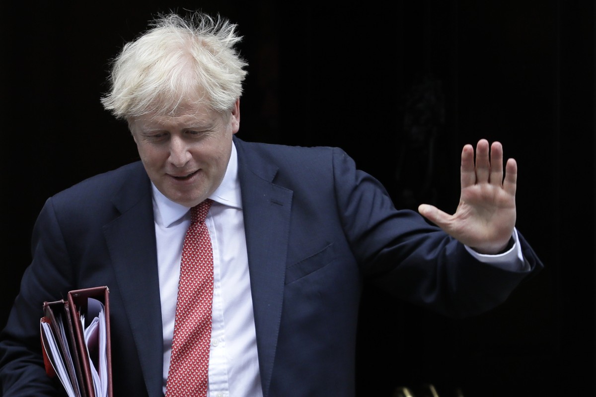 Britain's Prime Minister Boris Johnson leaves Downing Street in London, Wednesday, Sept. 2, 2020. The Prime Minister will attend the first session of Prime Ministers Questions since parliament re ...