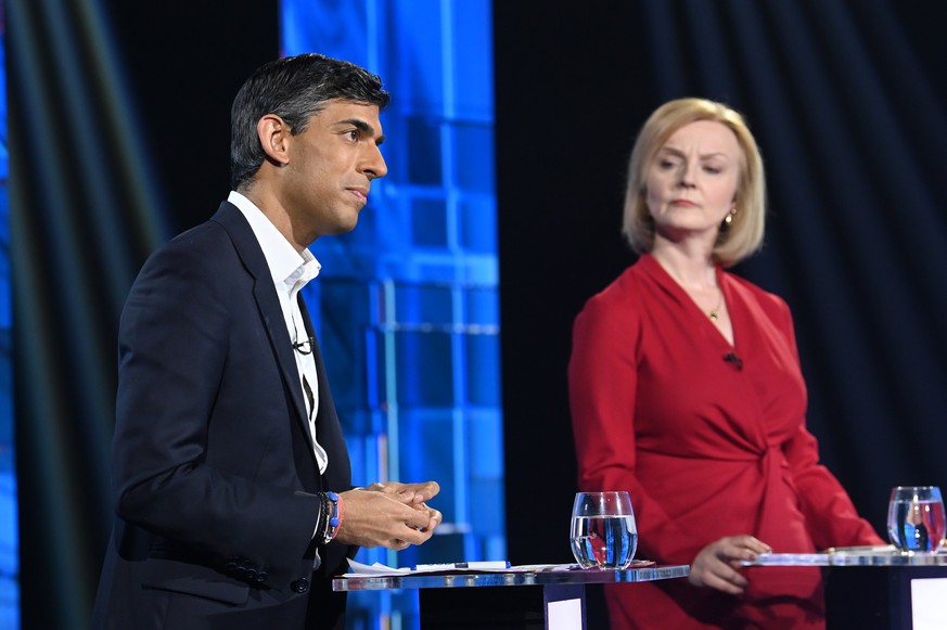 epa10076465 A handout photo made available by ITV shows Conservative leadership candidates Rishi Sunak and Liz Truss (R) during &#039;Britain&#039;s Next Prime Minister: The ITV Debate&#039; at Rivers ...