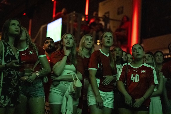 epa13096525 Swiss fans cheer during the 2026 FIFA World Cup soccer round of 16 soccer match between Switzerland and Colombia at the public viewing in the Maag Music Hall in Zurich, Switzerland on 07 J ...