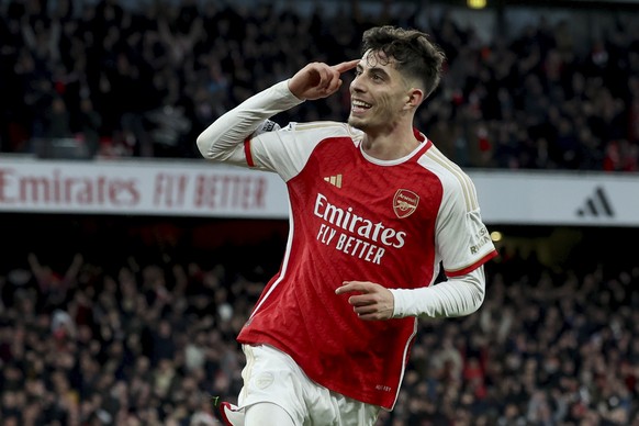 Arsenal&#039;s Kai Havertz celebrates after scoring his side&#039;s second goal during the English Premier League soccer match between Arsenal and Brighton and Hove Albion at the Emirates Stadium in L ...
