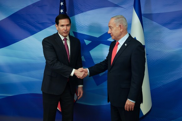 epa12476449 US Secretary of State Marco Rubio (L) and Israel's Prime Minister Benjamin Netanyahu following their meeting at the Prime Minister's office in Jerusalem on October 23, 2025. Rubi ...