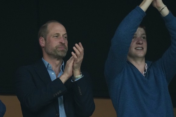 Britain's Prince William, left, applauds after the Europa League final soccer match between Freiburg and Aston Villa in Istanbul, Turkey, Thursday, May 21, 2026. (AP Photo/Francisco Seco)
Prince  ...