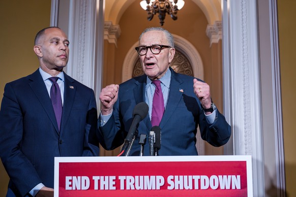 House Minority Leader Hakeem Jeffries, D-N.Y., left, and Senate Minority Leader Chuck Schumer, D-N.Y., speak to reporters outside the Senate chamber as they charge President Donald Trump and the Repub ...