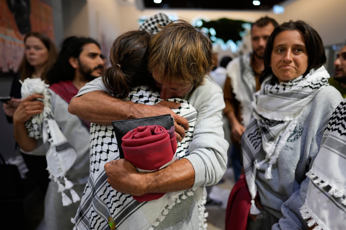 Activists from the Global Sumud Flotilla comfort each other upon their arrival at Istanbul Airport, in Istanbul, Turkey, Thursday, May 21, 2026. (AP Photo/Emrah Gurel)
APTOPIX Turkey Gaza Flotilla