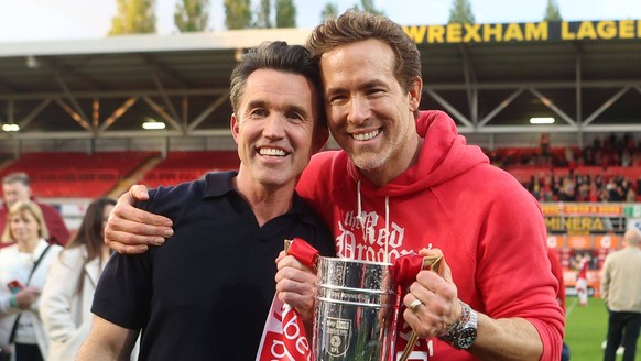 Wrexham co-owners Rob McElhenney and Ryan Reynolds as they celebrate promotion to the Championship AFC Wrexham v Charlton Athletic, EFL Sky Bet League One, Football, SToK Cae Ras, Wrexham, UK - 26 Apr ...