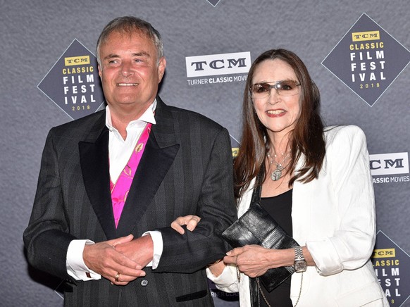 Olivia Hussey (R) and Leonard Whiting arrive for the TCM Classic Film Festival opening night gala screening of The Producers at the TCL Chinese Theatre in Los Angeles, California on April 26, 2018. PU ...