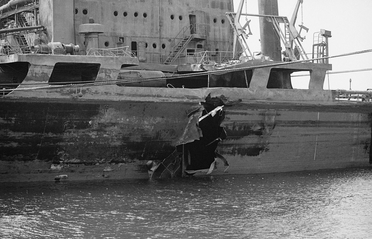 The Saudi Arabian supertanker ?Al-Ahood? moored in the Gulf on Sunday, May 27, 1984 its mangled super-structure burnt out after an Iraqi aircraft hit it earlier this month. (AP Photo/Fisk)