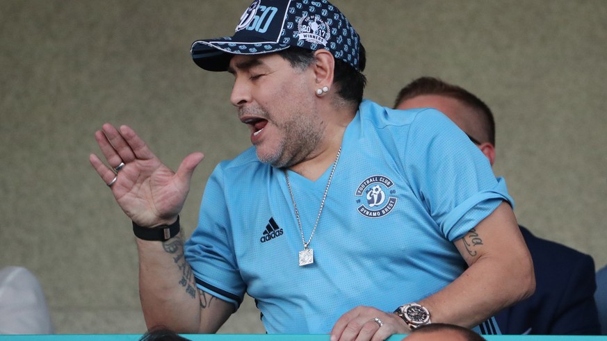 epa06893575 Former Argentinian soccer player Diego Maradona reacts during the soccer match between FC Dinamo Brest and FC Shakhtyor at the central stadium in Brest, Belarus, 16 July 2018. Maradona has ...