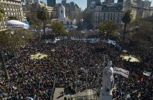 Supporters of Argentine Vice President Cristina Fernandez gather in the Plaza de Mayo, the day after a person pointed a gun at her outside her home in Buenos Aires, Argentina, Friday, Sept. 2, 2022. ( ...