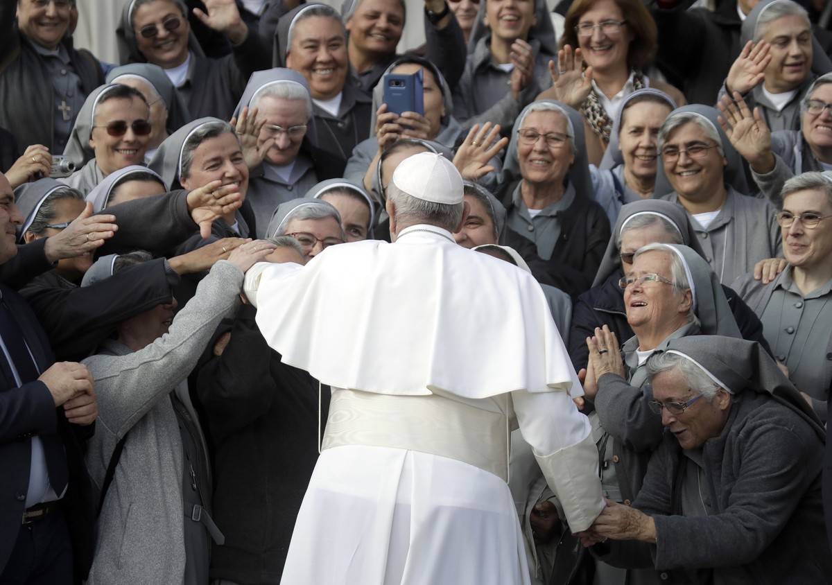 Pope Francis greets a group of nuns in St. Peter's Square at the Vatican at the end of his weekly general audience, Wednesday, Oct. 31, 2018. (AP Photo/Alessandra Tarantino)