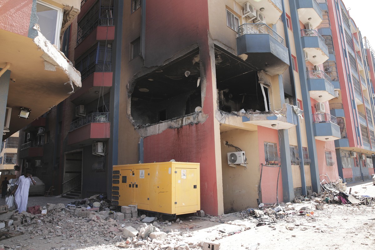 Residential buildings damaged in fighting are seen in Khartoum, Sudan, Thursday, April 20, 2023. The latest attempt at a cease-fire between the rival Sudanese forces faltered as gunfire rattled the ca ...