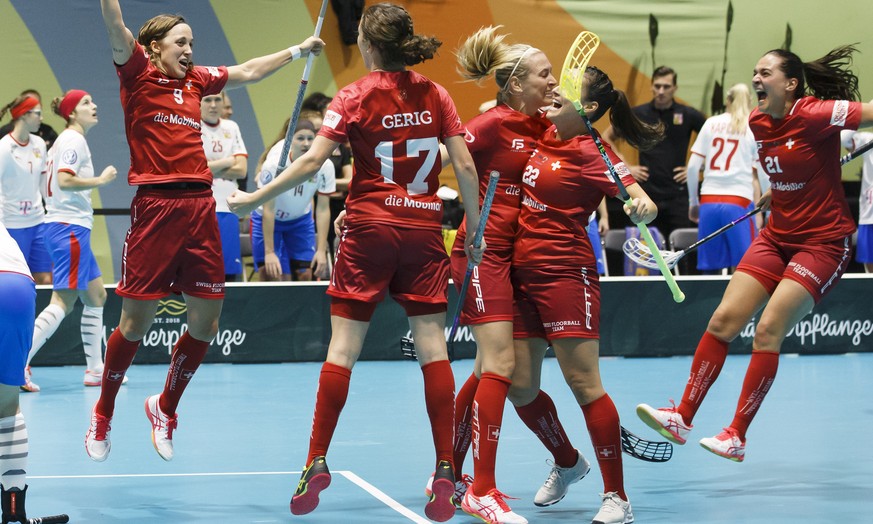 Switzerland&#039;s celebrate their goal after scoring the 6:6, during the 12th Women&#039;s World Floorball Championships semi final game between Switzerland and Czech Republic, in Neuchatel, Switzerl ...